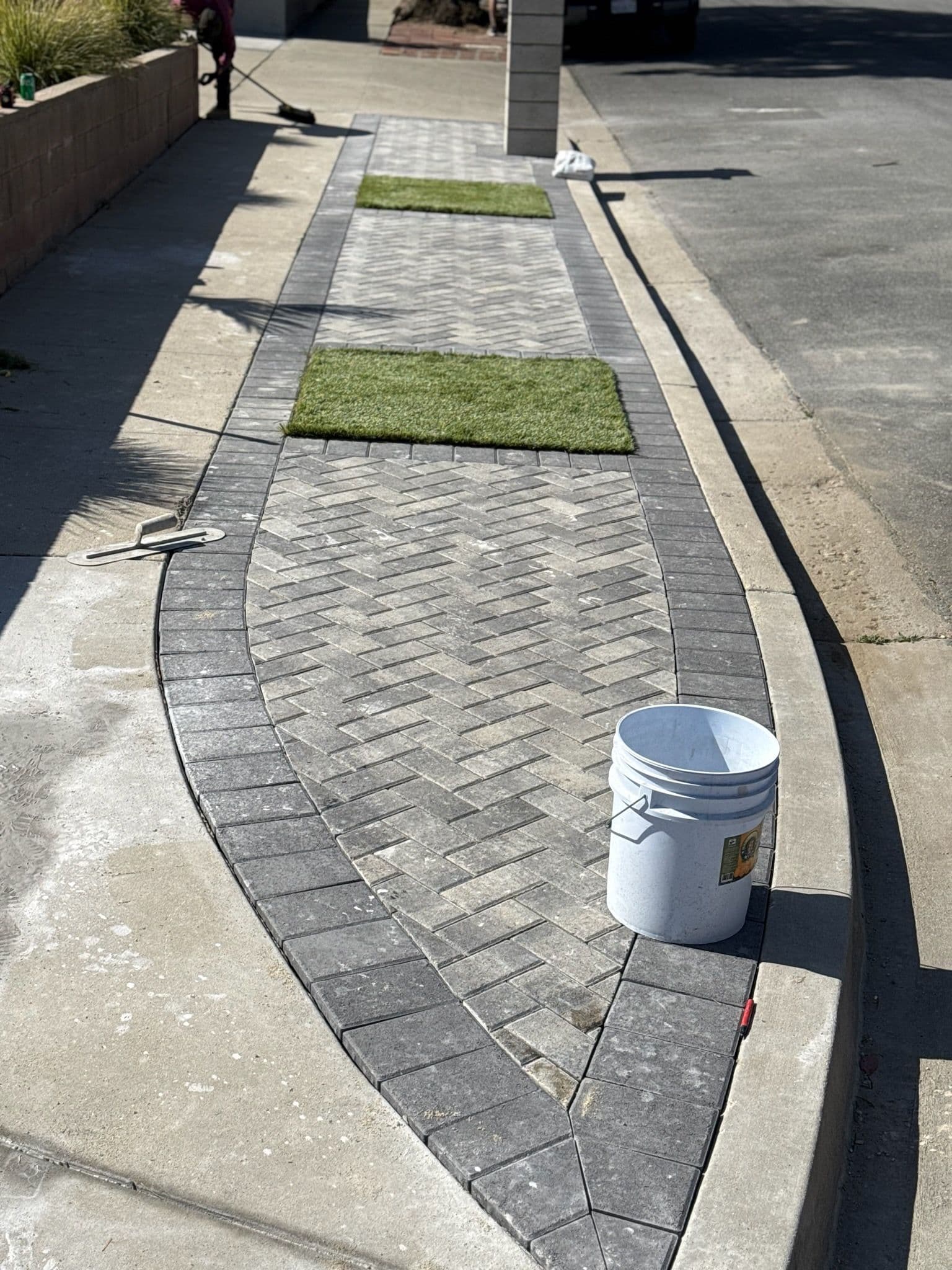 Craftsmanship in Gray - Elegant Herringbone Path image